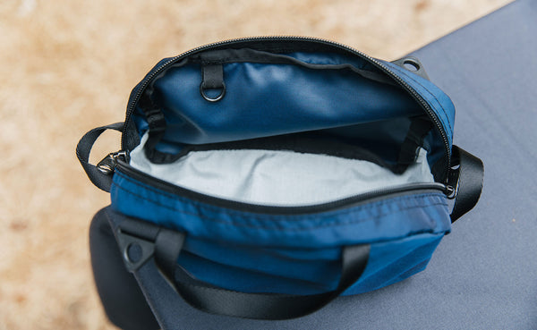 Navy Parapack Grab Bag zipped open: you can see one of the O-rings inside.